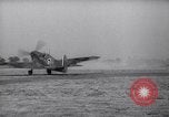 Image of British ground crewman assist RAF pilots of Spitfire fighter planes England United Kingdom, 1940, second 60 stock footage video 65675041005