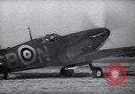 Image of Spitfire plane rearming and refueling United Kingdom, 1940, second 4 stock footage video 65675041012