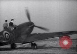 Image of Spitfire plane rearming and refueling United Kingdom, 1940, second 13 stock footage video 65675041012