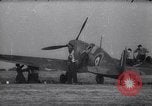Image of British Spitfire plane readied for take off England United Kingdom, 1940, second 1 stock footage video 65675041013