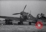 Image of British Spitfire plane readied for take off England United Kingdom, 1940, second 5 stock footage video 65675041013