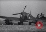 Image of British Spitfire plane readied for take off England United Kingdom, 1940, second 6 stock footage video 65675041013