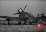 Image of British Spitfire plane readied for take off England United Kingdom, 1940, second 9 stock footage video 65675041013