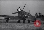 Image of British Spitfire plane readied for take off England United Kingdom, 1940, second 10 stock footage video 65675041013