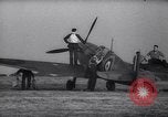 Image of British Spitfire plane readied for take off England United Kingdom, 1940, second 11 stock footage video 65675041013