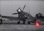 Image of British Spitfire plane readied for take off England United Kingdom, 1940, second 13 stock footage video 65675041013