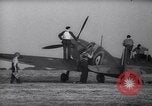 Image of British Spitfire plane readied for take off England United Kingdom, 1940, second 14 stock footage video 65675041013