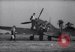 Image of British Spitfire plane readied for take off England United Kingdom, 1940, second 15 stock footage video 65675041013
