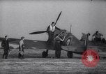 Image of British Spitfire plane readied for take off England United Kingdom, 1940, second 16 stock footage video 65675041013