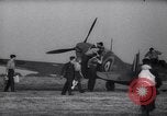 Image of British Spitfire plane readied for take off England United Kingdom, 1940, second 19 stock footage video 65675041013