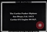 Image of U.S. Aviator, Lincoln Beachey in a Curtiss Pusher Biplane San Diego California USA, 1913, second 1 stock footage video 65675041062