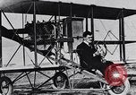 Image of U.S. Aviator, Lincoln Beachey in a Curtiss Pusher Biplane San Diego California USA, 1913, second 15 stock footage video 65675041062