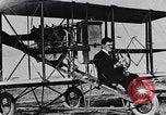 Image of U.S. Aviator, Lincoln Beachey in a Curtiss Pusher Biplane San Diego California USA, 1913, second 16 stock footage video 65675041062