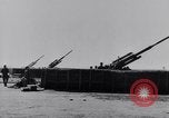 Image of 12.8cm FLAK 40 guns France, 1942, second 29 stock footage video 65675041081