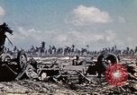 Image of Marines eliminate last Japanese defenders on Eniwetok Eniwetok Atoll Marshall Islands, 1944, second 26 stock footage video 65675041091