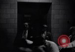 Image of Accused men with covered faces New York City USA, 1951, second 25 stock footage video 65675041144