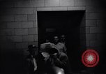 Image of Accused men with covered faces New York City USA, 1951, second 28 stock footage video 65675041144