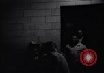 Image of Accused men with covered faces New York City USA, 1951, second 29 stock footage video 65675041144