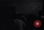 Image of Accused men with covered faces New York City USA, 1951, second 30 stock footage video 65675041144