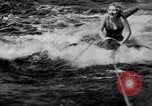 Image of surfing Venice Beach Los Angeles California USA, 1935, second 19 stock footage video 65675041280