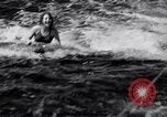 Image of surfing Venice Beach Los Angeles California USA, 1935, second 21 stock footage video 65675041280