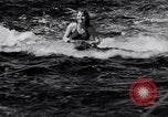 Image of surfing Venice Beach Los Angeles California USA, 1935, second 22 stock footage video 65675041280