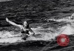 Image of surfing Venice Beach Los Angeles California USA, 1935, second 30 stock footage video 65675041280
