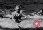 Image of surfing Venice Beach Los Angeles California USA, 1935, second 31 stock footage video 65675041280