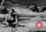 Image of surfing Venice Beach Los Angeles California USA, 1935, second 33 stock footage video 65675041280