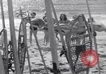 Image of surfing Venice Beach Los Angeles California USA, 1935, second 38 stock footage video 65675041280
