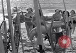 Image of surfing Venice Beach Los Angeles California USA, 1935, second 39 stock footage video 65675041280