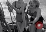 Image of surfing Venice Beach Los Angeles California USA, 1935, second 43 stock footage video 65675041280