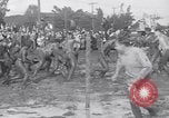 Immagine di Il fango wrestling Los Angeles California USA, 1936, secondo 12 filmato di repertorio 65675041292