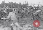 Immagine di Il fango wrestling Los Angeles California USA, 1936, secondo 13 filmato di repertorio 65675041292