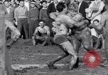 Immagine di Il fango wrestling Los Angeles California USA, 1936, secondo 15 filmato di repertorio 65675041292