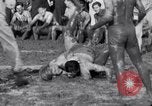 Immagine di Il fango wrestling Los Angeles California USA, 1936, secondo 18 filmato di repertorio 65675041292