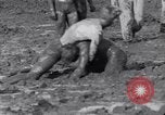 Immagine di Il fango wrestling Los Angeles California USA, 1936, secondo 30 filmato di repertorio 65675041292