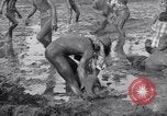 Immagine di Il fango wrestling Los Angeles California USA, 1936, secondo 44 filmato di repertorio 65675041292
