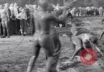 Immagine di Il fango wrestling Los Angeles California USA, 1936, secondo 53 filmato di repertorio 65675041292