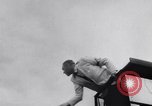 Standbild Racing event Indianapolis Indiana USA, 1956, aus Sekunde 62 historischem Filmmaterial Videoclip 65675041376