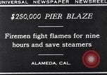 Image of pier blaze Alameda California USA, 1929, second 3 stock footage video 65675041387