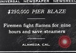 Image of pier blaze Alameda California USA, 1929, second 4 stock footage video 65675041387