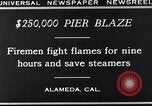 Image of pier blaze Alameda California USA, 1929, second 5 stock footage video 65675041387