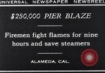 Image of pier blaze Alameda California USA, 1929, second 7 stock footage video 65675041387
