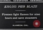 Image of pier blaze Alameda California USA, 1929, second 11 stock footage video 65675041387