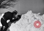 Image of snowfall Omaha Nebraska USA, 1937, second 40 stock footage video 65675041414