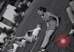 Immagine di Le ragazze di tiro con l'arco Los Angeles California USA, 1937, secondo 59 filmato di repertorio 65675041450