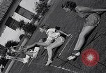 Immagine di Le ragazze di tiro con l'arco Los Angeles California USA, 1937, secondo 61 filmato di repertorio 65675041450