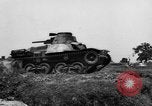 Image of Japanese tank crosses ditch India, 1944, second 13 stock footage video 65675041509