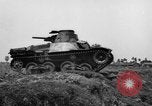 Image of Japanese tank crosses ditch India, 1944, second 20 stock footage video 65675041509